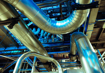 Image showing Equipment, cables and piping as found inside of a modern industr