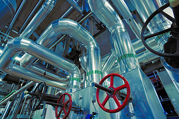 Image showing Equipment, cables and piping as found inside of a modern industr