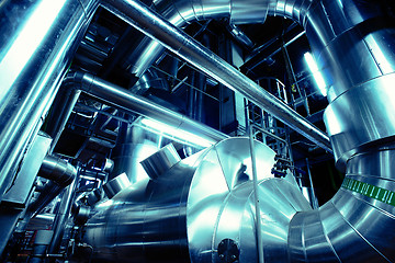 Image showing Equipment, cables and piping as found inside of a modern industr