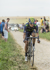 Image showing Anacona Gomez Riding on a Cobblestone Road - Tour de France 2015