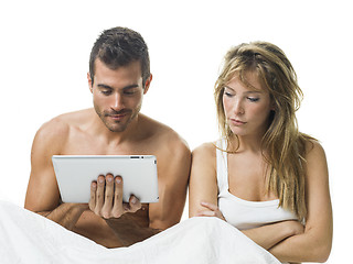 Image showing uncommunicative couple on bed in white 