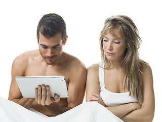 Image showing uncommunicative couple on bed in white 