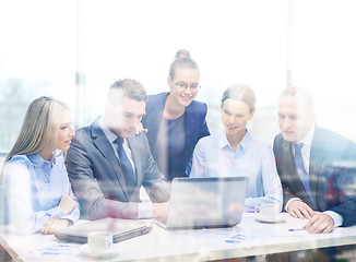 Image showing business team with laptop having discussion