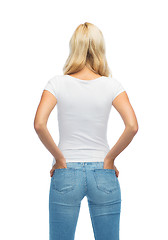 Image showing rear view of young woman in blank white t-shirt