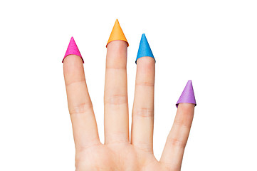 Image showing close up of hand with four fingers in party hats