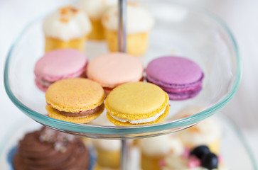 Image showing close up of cake stand with macaroon cookies