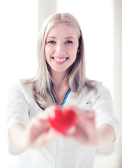 Image showing female doctor with heart