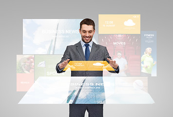 Image showing happy businessman with weather forecast app