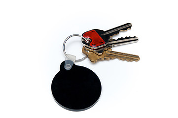 Image showing three keys over white with black blank fob
