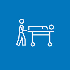 Image showing Man pushing stretchers line icon.