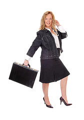 Image showing Business woman walking with briefcase.