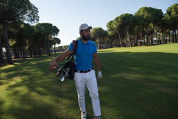 Image showing golf player walking