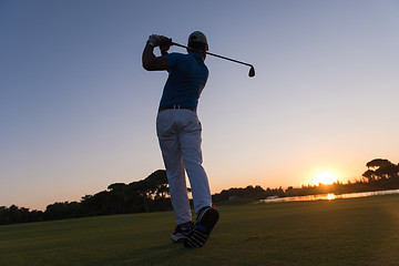 Image showing golfer hitting long shot