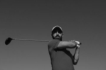 Image showing golf player hitting shot