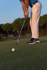 Image showing golfer  hitting shot at golf course