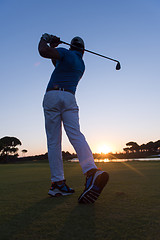 Image showing golfer hitting long shot