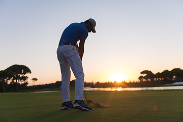 Image showing golfer hitting long shot