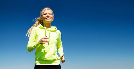 Image showing woman jogging outdoors