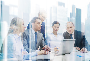 Image showing business team with laptop having discussion