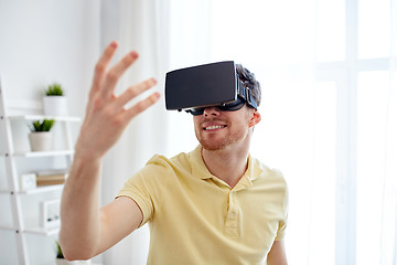 Image showing young man in virtual reality headset or 3d glasses