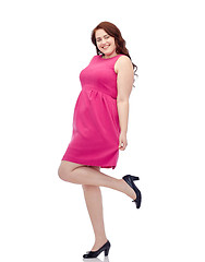 Image showing happy young plus size woman posing in pink dress