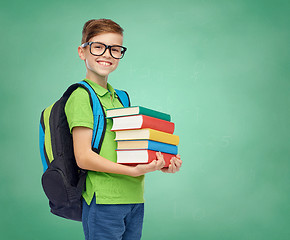 Image showing happy student boy with school bag and books