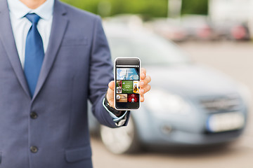 Image showing close up of business man with smartphone media