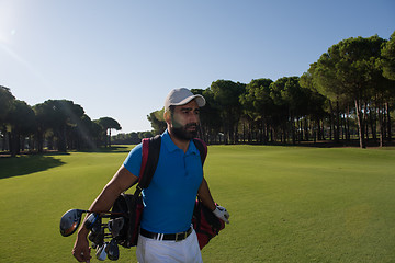 Image showing golf player walking