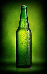 Image showing Delicious beer on green