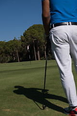 Image showing golf player portrait from back