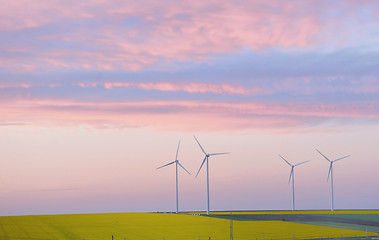 Image showing Eolian field and wind turbines at sunset