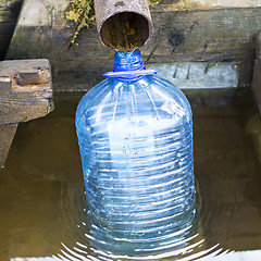 Image showing Collect drinking water at a spring