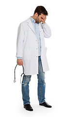 Image showing Doctor with a stethoscope trying to deliver bad news