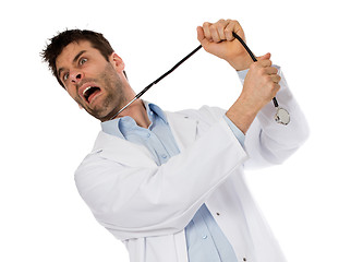 Image showing Humorous portrait of a young depressed suicidal surgeon with a s