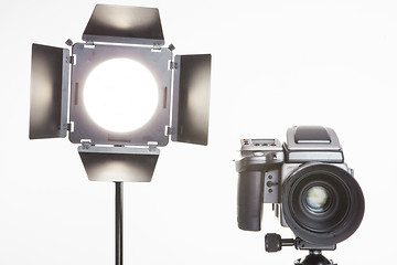 Image showing medium format  proffesional camera and studio light with barn doors