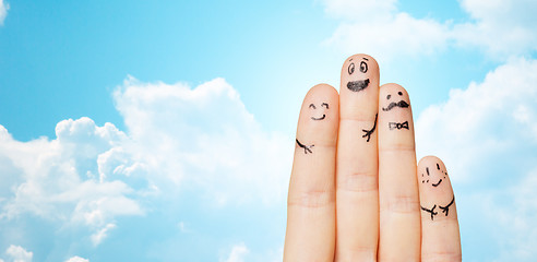 Image showing close up of hands and fingers with smiley faces