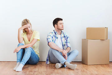 Image showing unhappy couple having argument at home