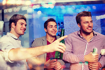 Image showing group of male friends with beer in nightclub