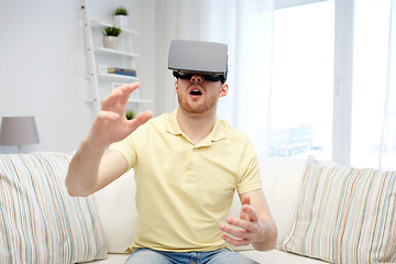 Image showing young man in virtual reality headset or 3d glasses