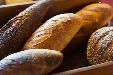 Image showing close up of bread loafs at bakery