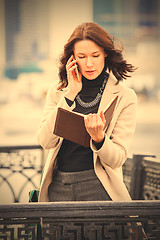 Image showing business woman talking on a cell phone