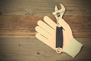 Image showing white glove and adjustable spanner