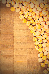 Image showing dry peas on cork background