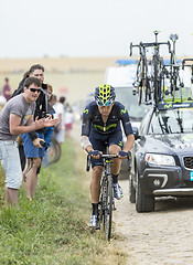 Image showing Alex Dowsett Riding on a Cobblestone Road - Tour de France 2015