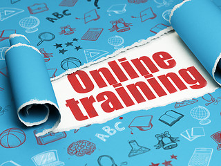 Image showing Studying concept: red text Online Training under the piece of  torn paper