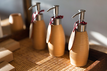 Image showing close up of liquid soap or body lotion at bathroom