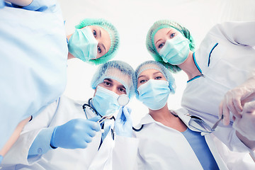 Image showing group of doctors in operating room