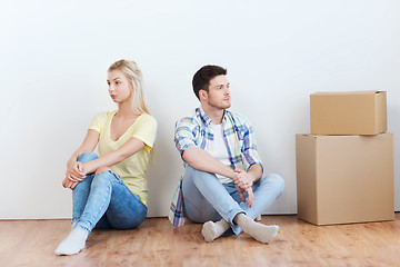 Image showing unhappy couple having argument at home