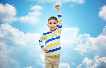 Image showing happy smiling little boy with raised hand