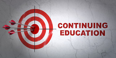 Image showing Education concept: target and Continuing Education on wall background